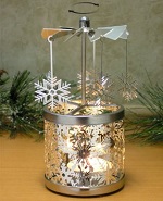Spinning snowflake candle